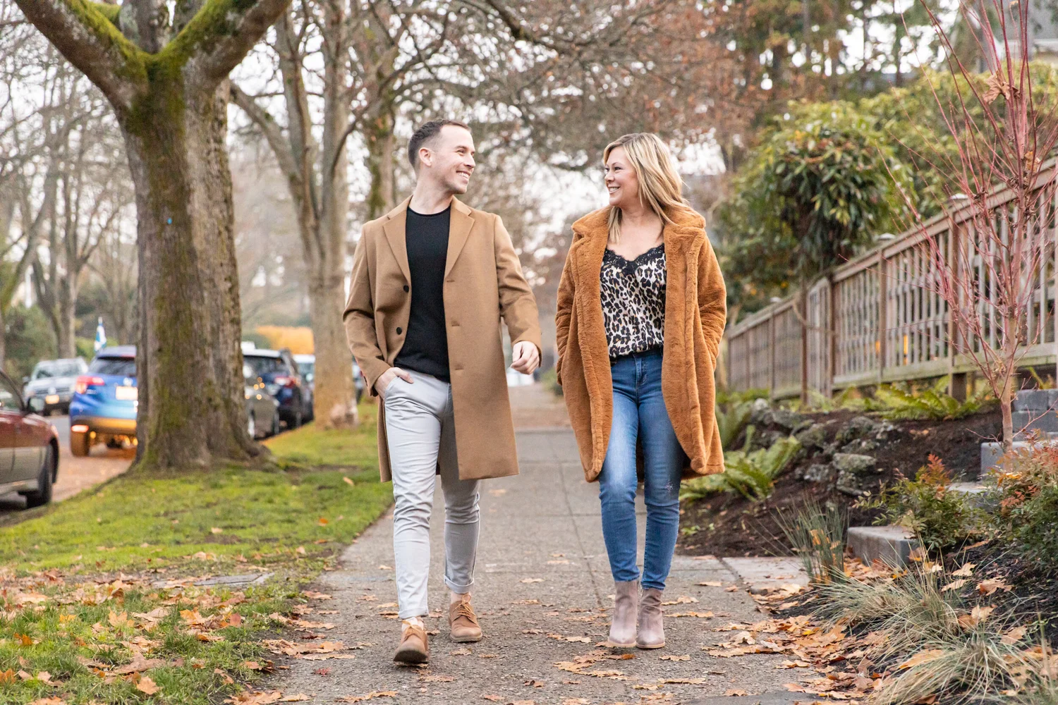 Wesley Gardner walking with clients on a Seattle residential street